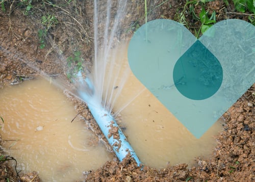 Burst pipe leaking water into the ground