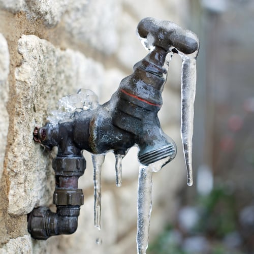 A frozen outdoor water tap