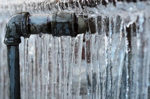 Why do water mains burst more during winter months?