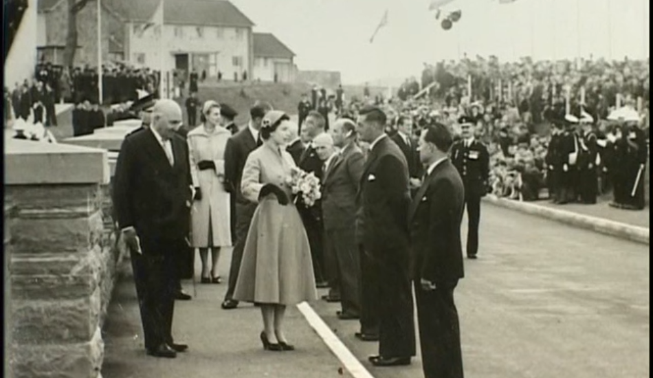 Queen Elizabeth II meets men in suits who worked on the Chew Valley Lake construction