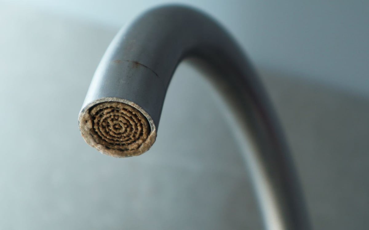 Limescale build up on a tap due to hard water