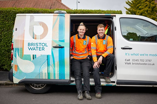Bristol Water workers by their work van