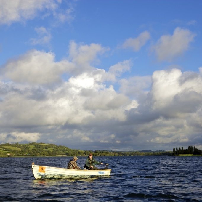 2 men fishing in a boat on Blagdon Lake