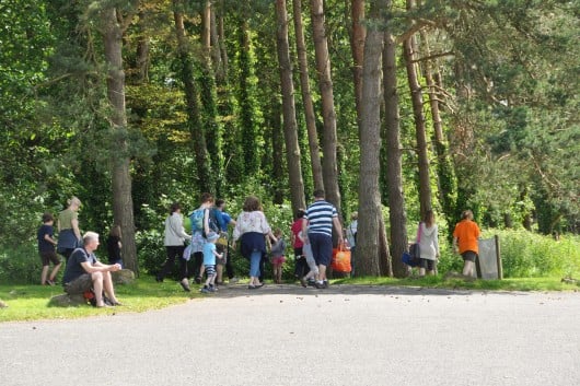 A group of people heading into the woods, enjoying chew valley park